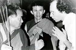 Lama Yeshe ‘instructs’ Jon Landaw while Gonsar Rinpoche looks on.